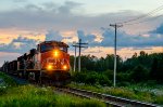 CN 2274 leads 402 at Jospeh Paradis road with a beatiful sunset
